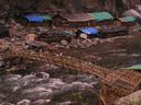 A couple fantastic bamboo bridges cross the river at the hotspring village.